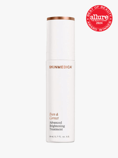 A white bottle of SkinMedica Even & Correct Advanced Brightening Treatment on a light gray background with a red Allure 2024 Best of Beauty Award winner seal